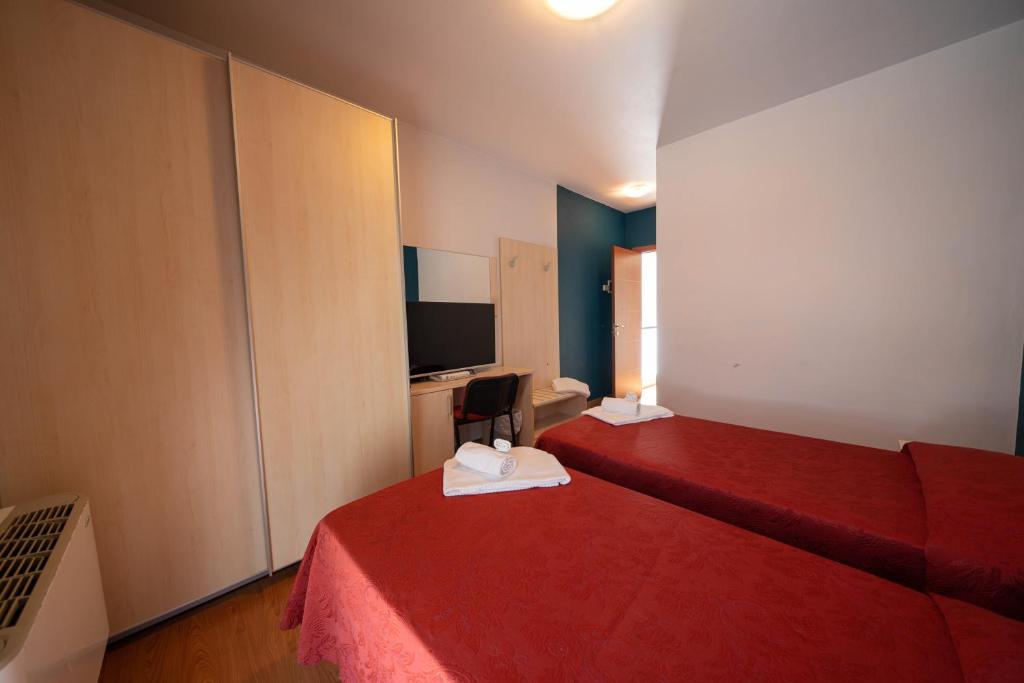 Postel nebo postele na pokoji v ubytování Hotel Break House Ristorante