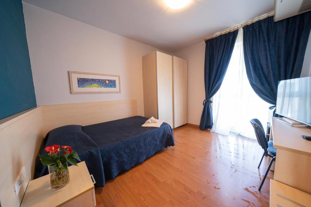 Postel nebo postele na pokoji v ubytování Hotel Break House Ristorante