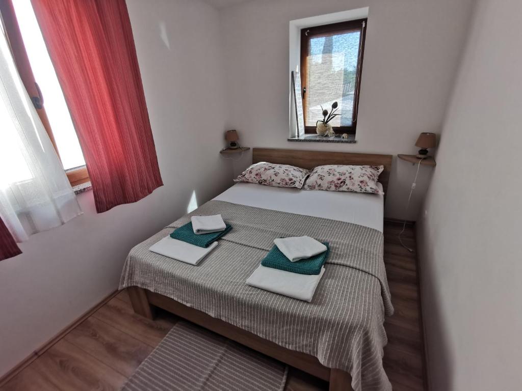 Posteľ alebo postele v izbe v ubytovaní House Mare