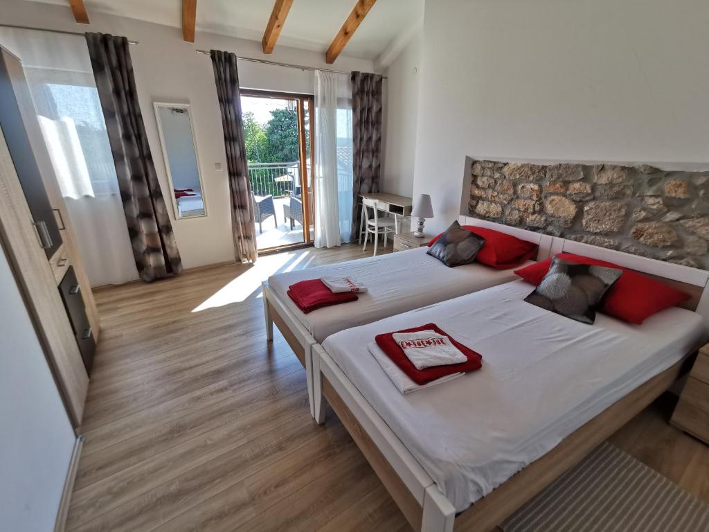 Posteľ alebo postele v izbe v ubytovaní House Mare