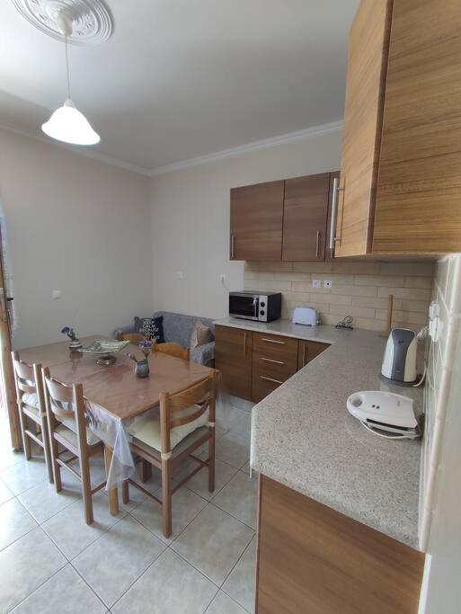 Kuchyňa alebo kuchynka v ubytovaní Konomi Residence-Marilena Apartment