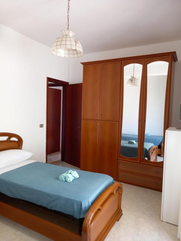 Posteľ alebo postele v izbe v ubytovaní Casa vacanze Blu Taormina