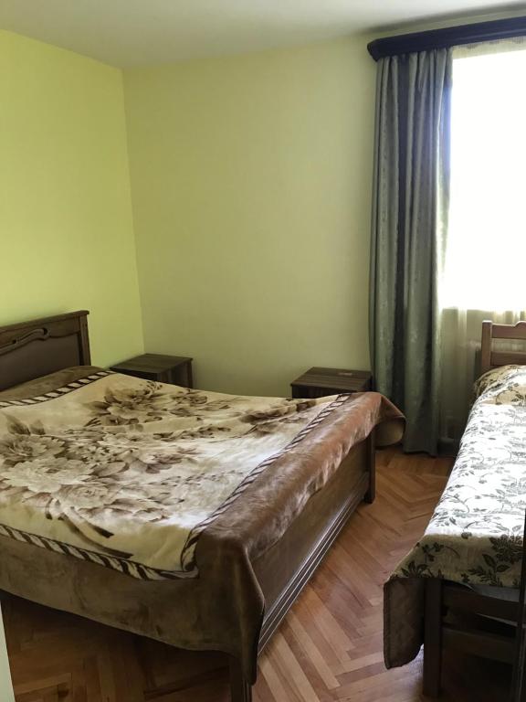 Postel nebo postele na pokoji v ubytování MITANE