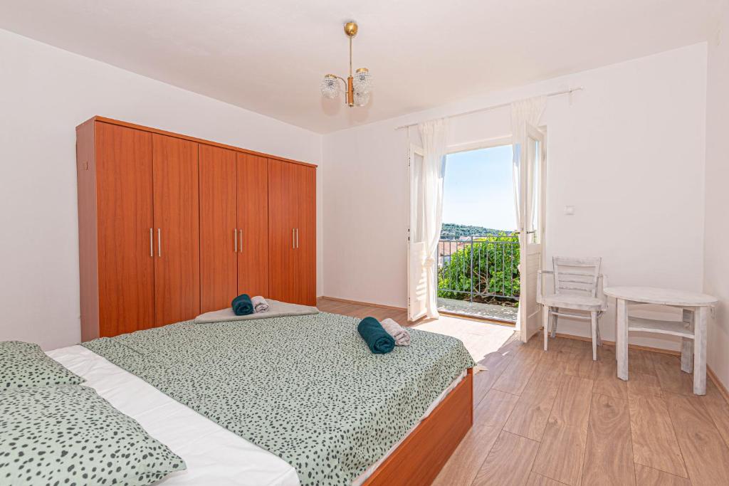 Posteľ alebo postele v izbe v ubytovaní Apartment Nocturno