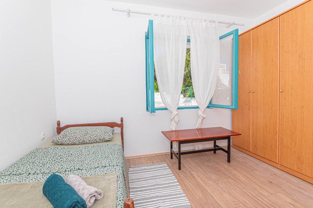 Posteľ alebo postele v izbe v ubytovaní Apartment Nocturno