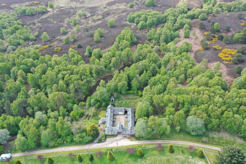 an old house in the middle of a forest at Brylach Steading in Aberlour
