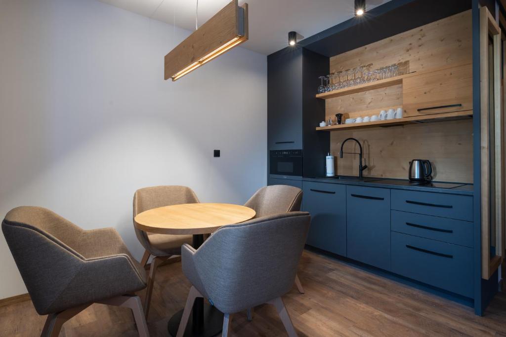 Kuchyň nebo kuchyňský kout v ubytování NIPUR sk-Apartmán Hotel Ovruč, Štrbské Pleso