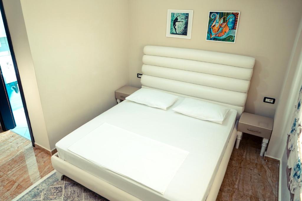 Postel nebo postele na pokoji v ubytování Hotel Magic