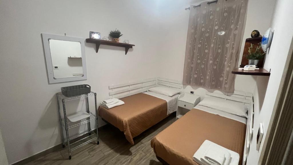 Postel nebo postele na pokoji v ubytování Summer Paradise