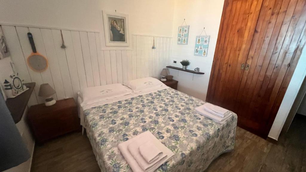 Postel nebo postele na pokoji v ubytování Summer Paradise