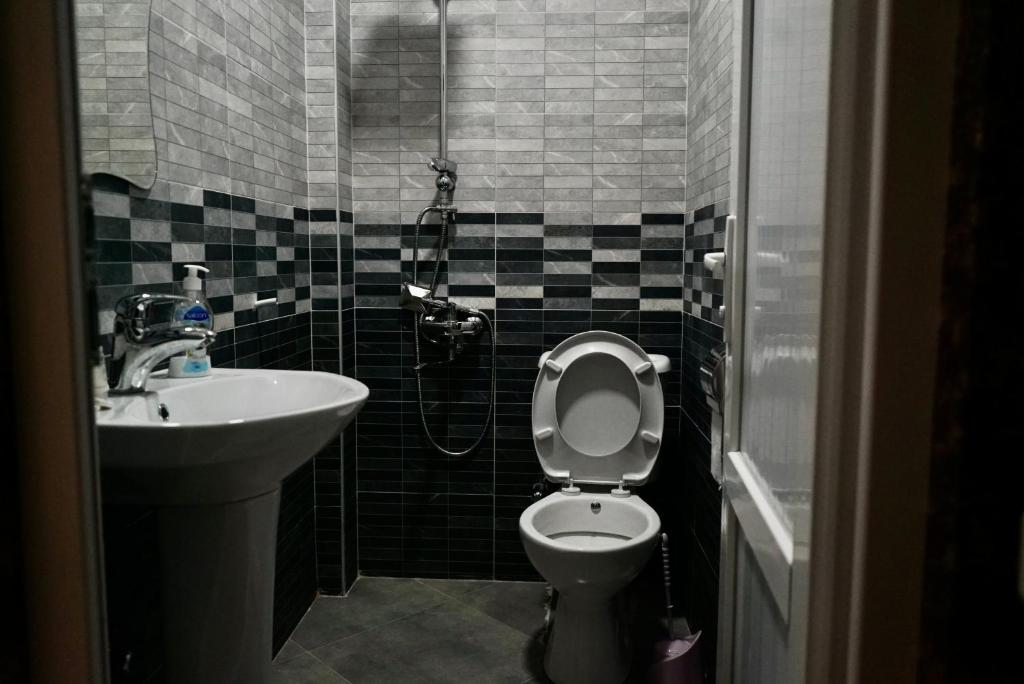 Koupelna v ubytování hotel Vaxx