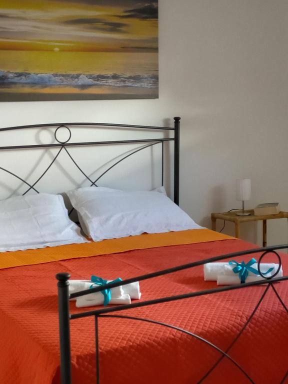 Postel nebo postele na pokoji v ubytování Casa Moniceddhi