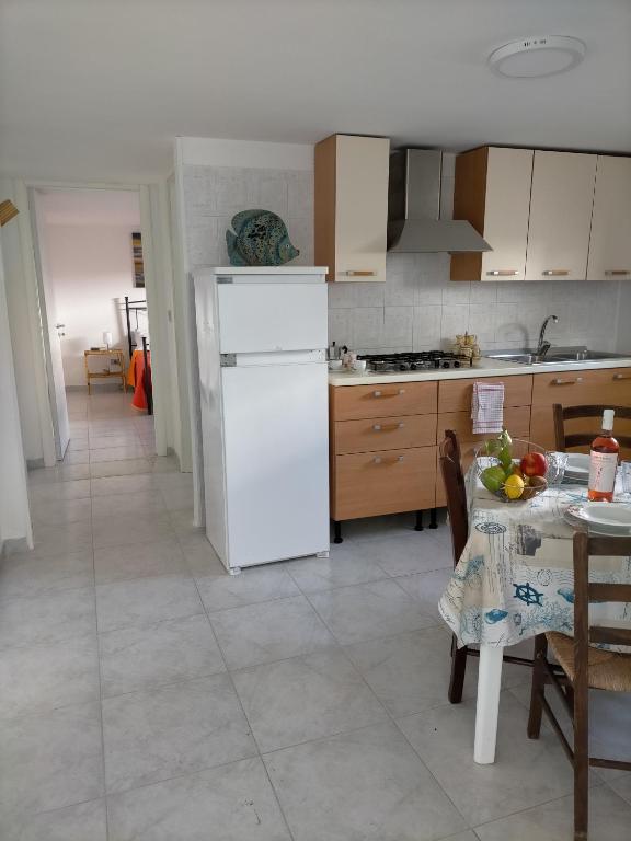 Kuchyň nebo kuchyňský kout v ubytování Casa Moniceddhi