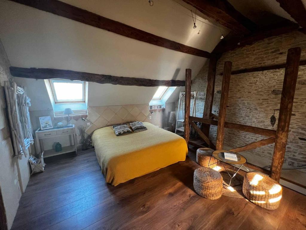 Postel nebo postele na pokoji v ubytování Le mas Normand
