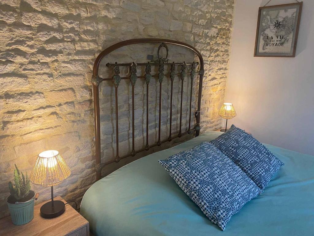 Postel nebo postele na pokoji v ubytování Le mas Normand