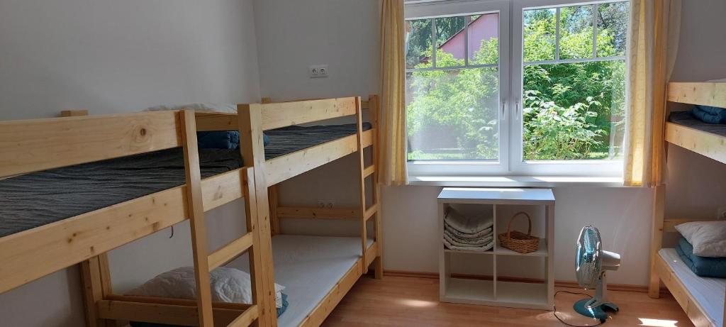 Posteľ alebo postele v izbe v ubytovaní Hostel Zamárdi