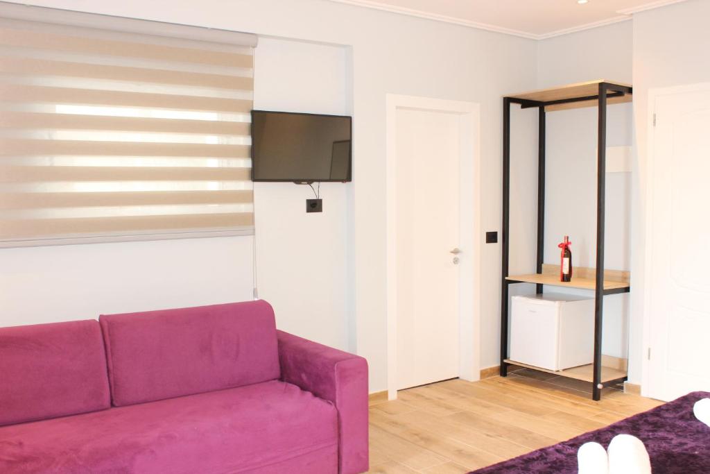 TV a/nebo společenská místnost v ubytování Bebi Hotel And Apartments