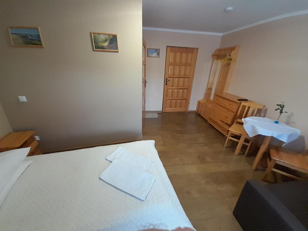 Posteľ alebo postele v izbe v ubytovaní EMAR