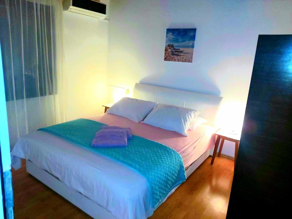 Postel nebo postele na pokoji v ubytování Apartman Arija-Pino