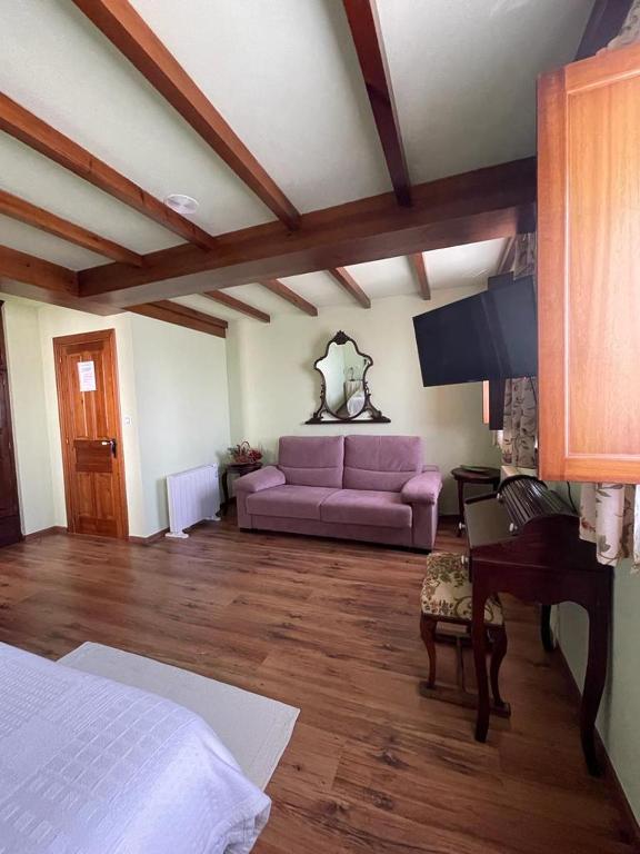 Cama o camas de una habitación en Hotel Rural As Laguas