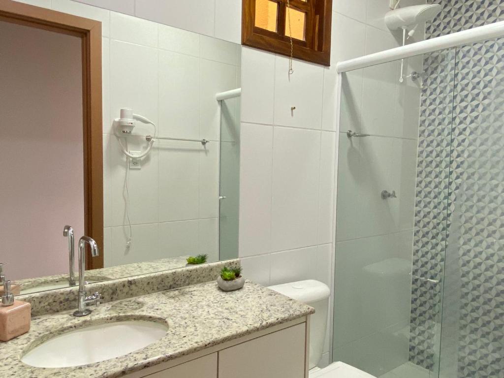 Ванная комната в Casa Recanto Feliz