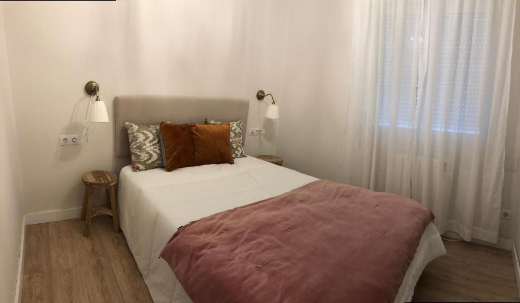 Postel nebo postele na pokoji v ubytování La Casita de El Montan Baja
