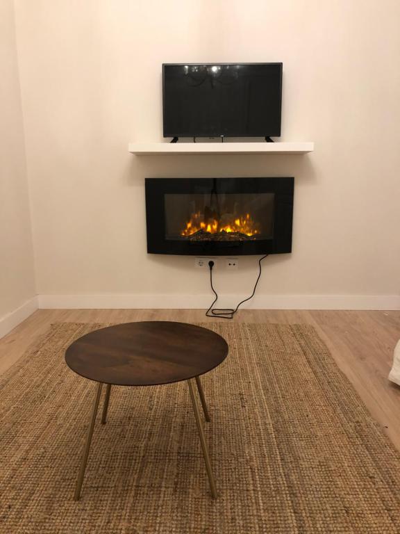 TV a/nebo společenská místnost v ubytování La Casita de El Montan Baja