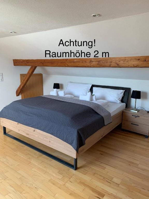 Postel nebo postele na pokoji v ubytování HGH - Hotel Garni Helbig