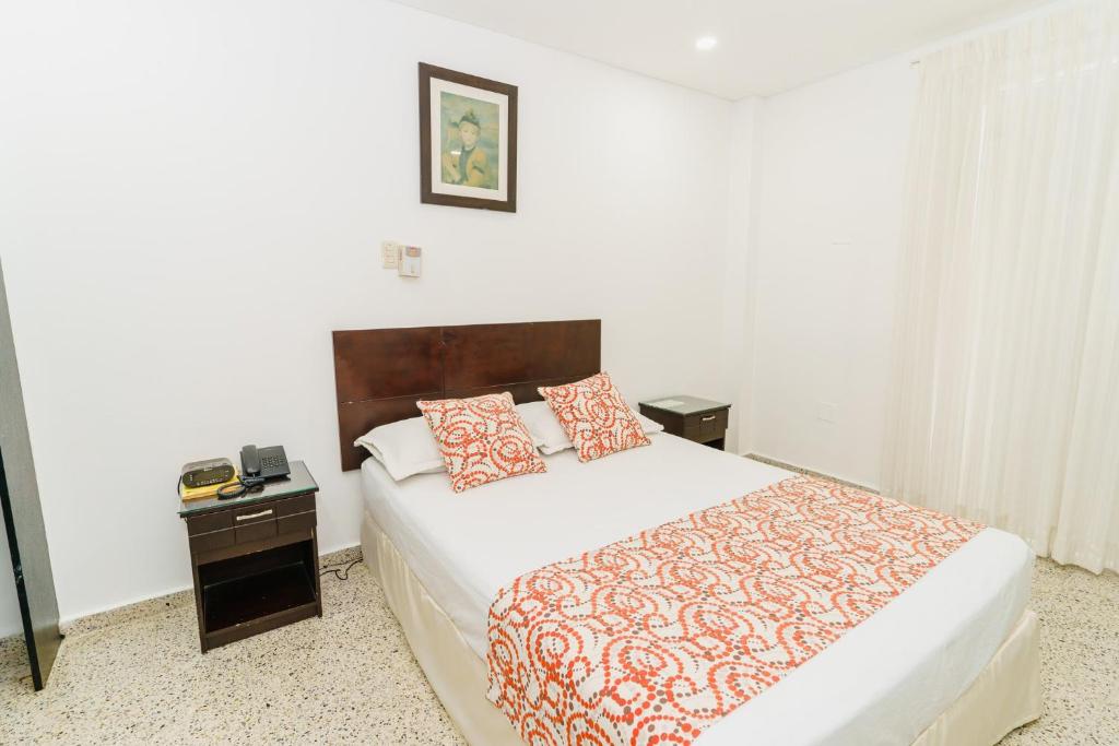 Postel nebo postele na pokoji v ubytování Hotel Las Molas