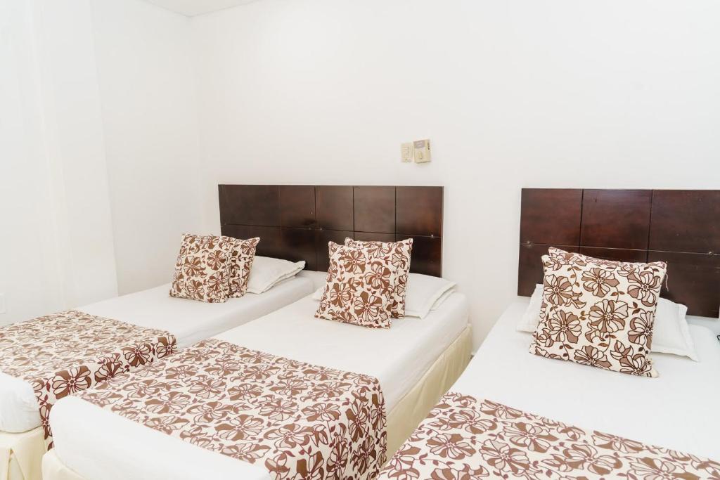 Postel nebo postele na pokoji v ubytování Hotel Las Molas