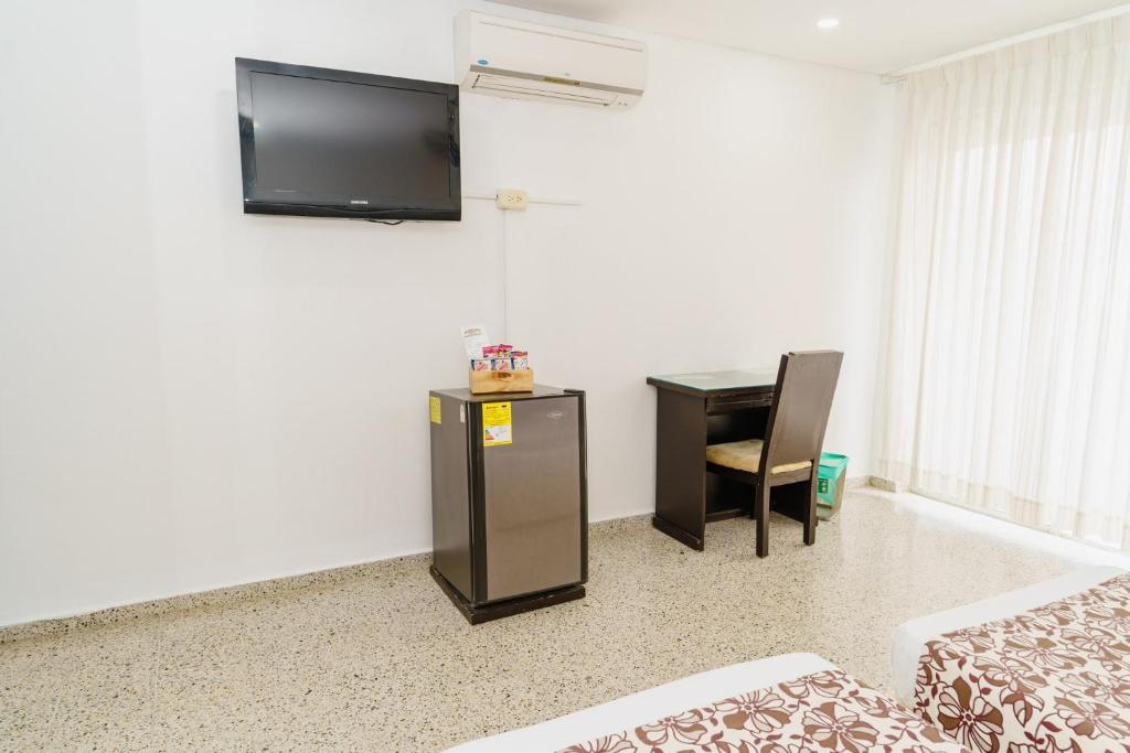TV a/nebo společenská místnost v ubytování Hotel Las Molas