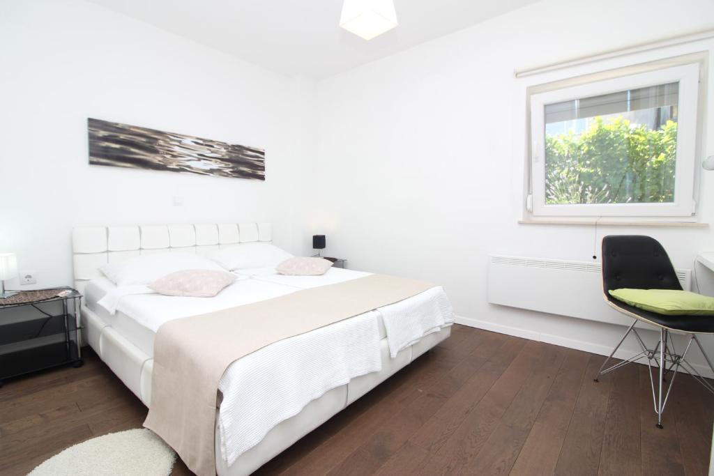 Posteľ alebo postele v izbe v ubytovaní Apartments Seccareccia