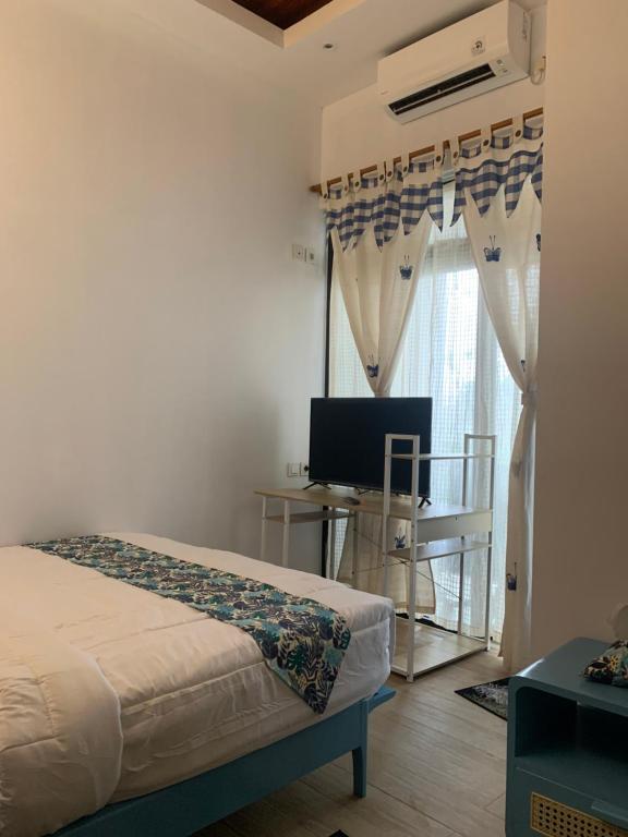 Postel nebo postele na pokoji v ubytování PALAGAN HUIS