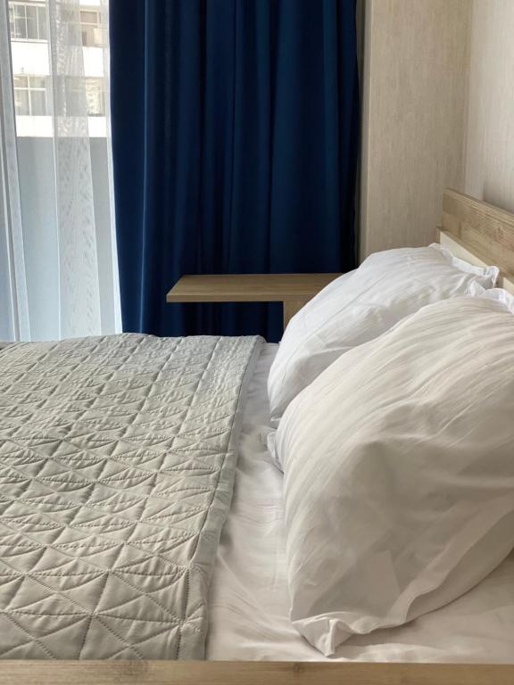 Postel nebo postele na pokoji v ubytování Orange Batumi Travel