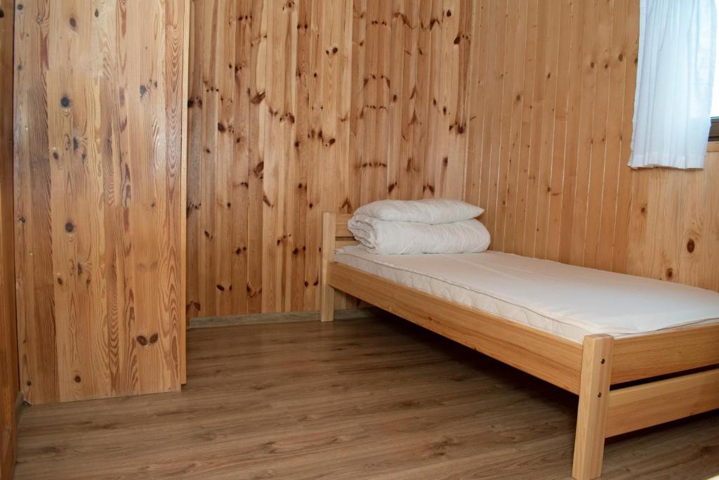 Postel nebo postele na pokoji v ubytování Promyk
