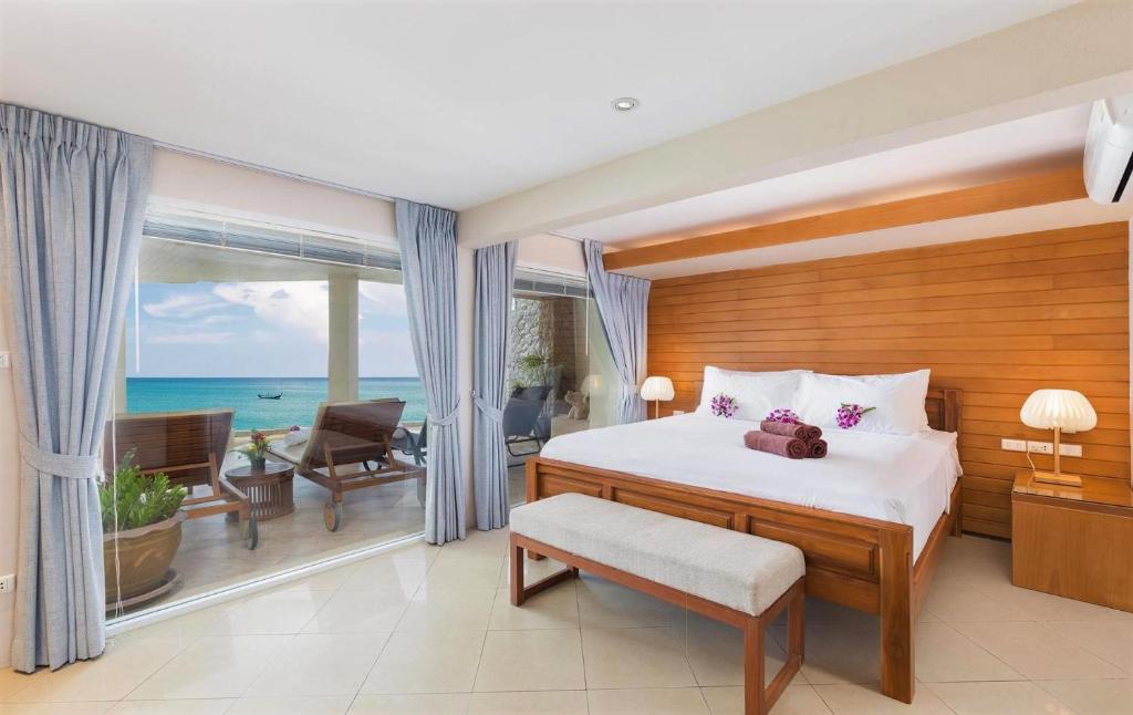 Postel nebo postele na pokoji v ubytování Beachfront Kalim Beach Villa