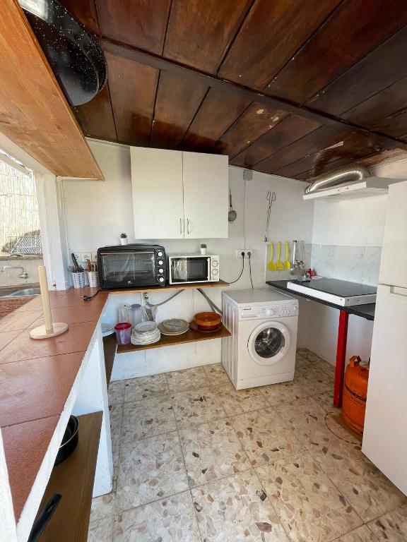 Kuchyň nebo kuchyňský kout v ubytování Casa Rural Los Caballos Finca Canca Alora Caminito del Rey