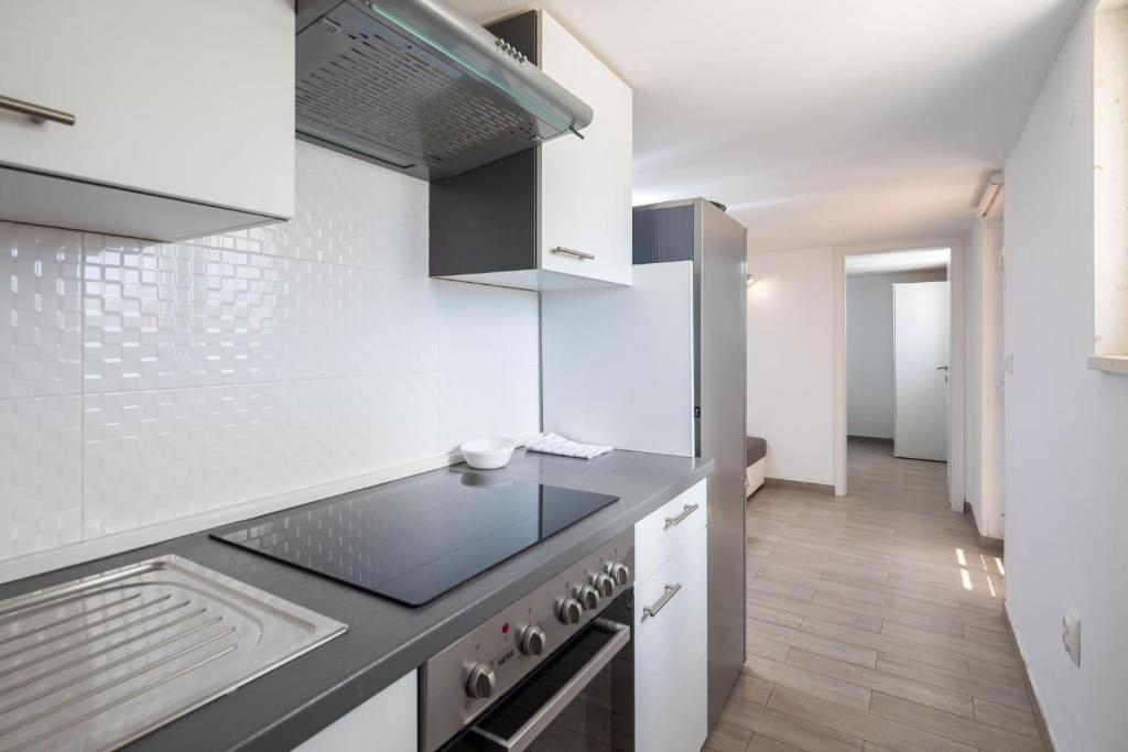 Kuchyňa alebo kuchynka v ubytovaní Vila Blanka Apartments