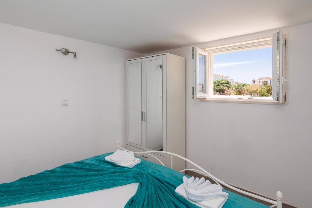 Posteľ alebo postele v izbe v ubytovaní Vila Blanka Apartments