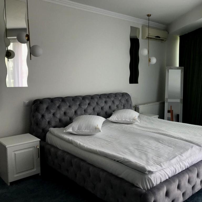 Postel nebo postele na pokoji v ubytování Hotel SunGarden Salin