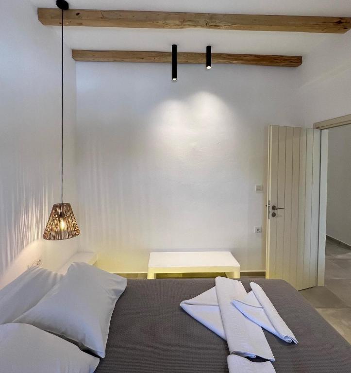 Postel nebo postele na pokoji v ubytování Alidian bay Suites Leros