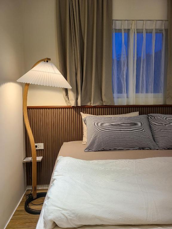 Voodi või voodid majutusasutuse Good Day Homestay toas