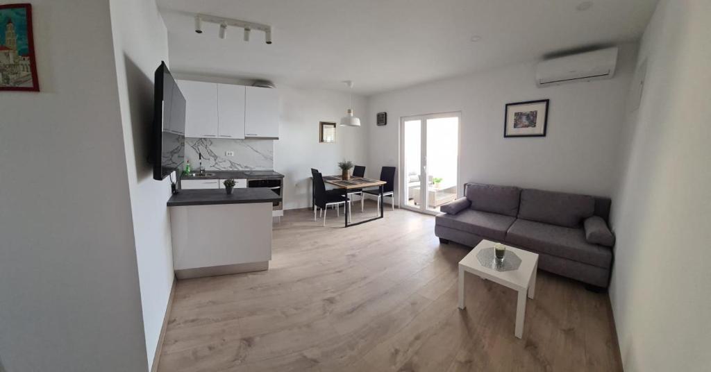 Kuchyňa alebo kuchynka v ubytovaní Apartment By the Mall