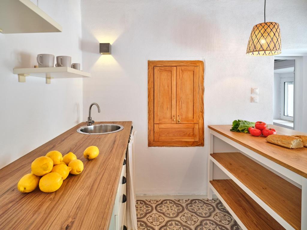 A kitchen or kitchenette at Psathi Beach House