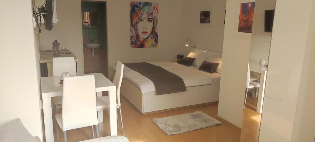 Postel nebo postele na pokoji v ubytování Apartmány EMMA