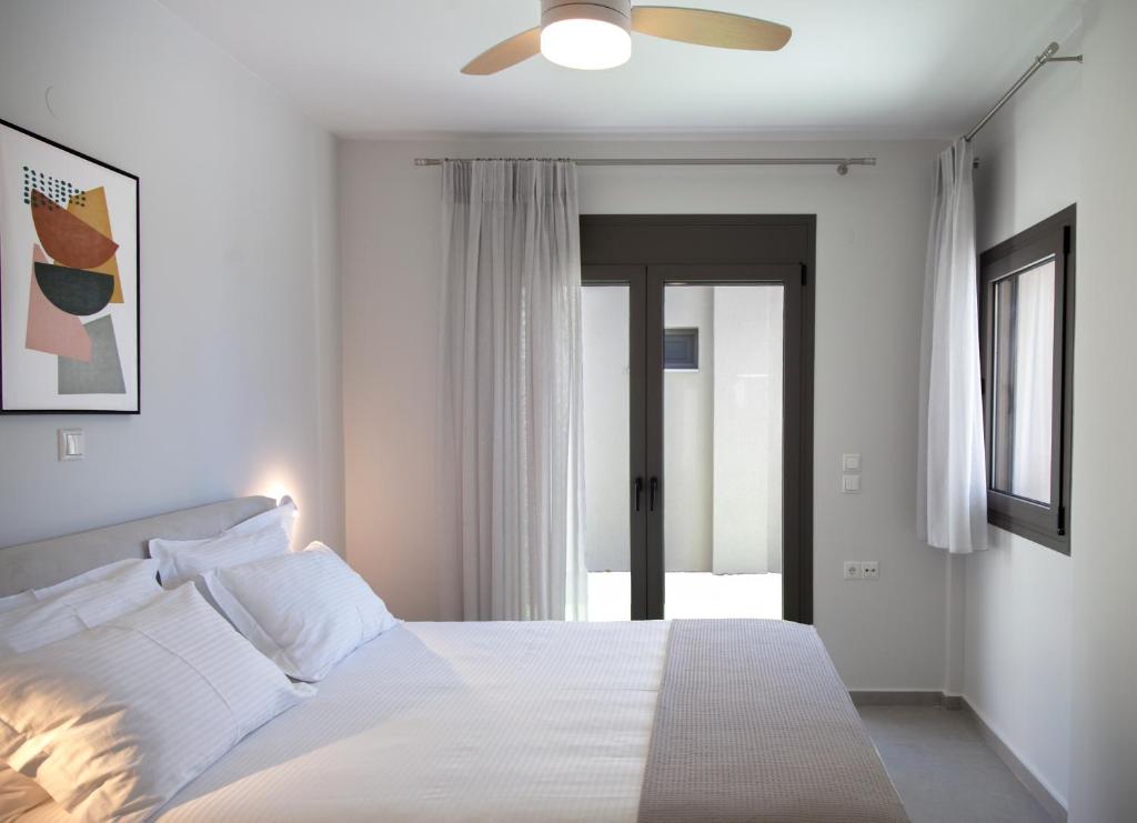 Posteľ alebo postele v izbe v ubytovaní LUMIERE VILLAS