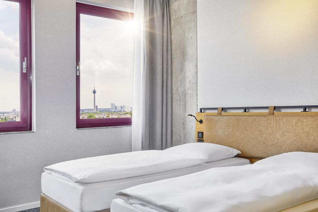 H2 Hotel Düsseldorf Seestern - Resim 11