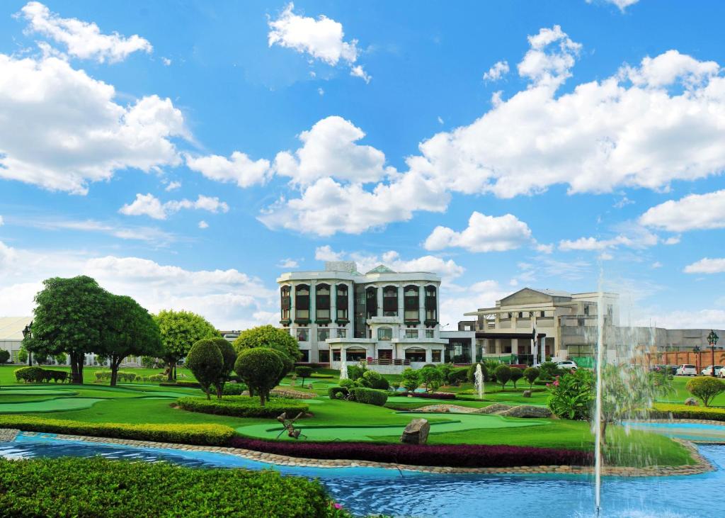 a rendering of a building with a fountain at Bahria Grand Hotel & Resort in Lahore