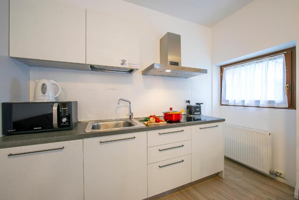 Kuchyňa alebo kuchynka v ubytovaní Arco Rocks Apartments
