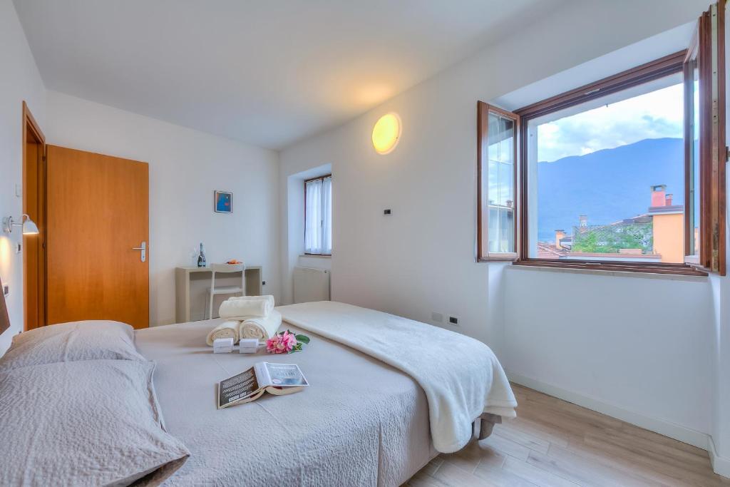 Posteľ alebo postele v izbe v ubytovaní Arco Rocks Apartments